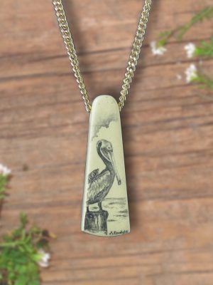 pelican resting on piling