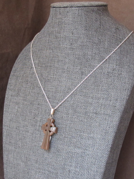 Mammoth Celtic cross carved