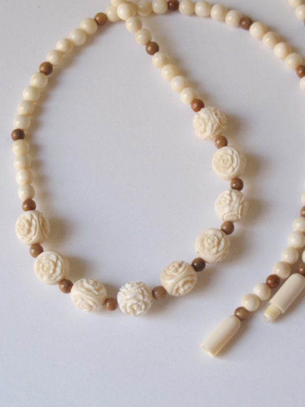 Mammoth carved rose beads