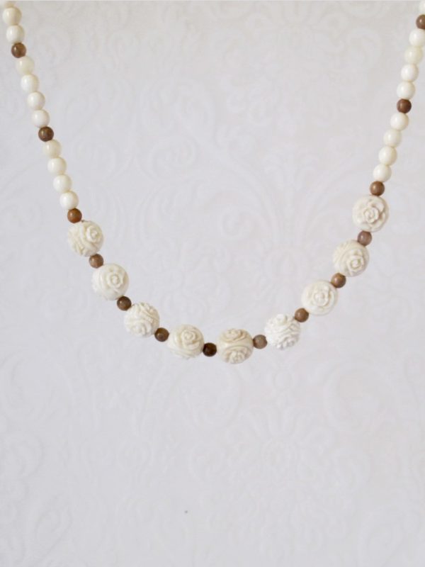 Carved beads mammoth roses