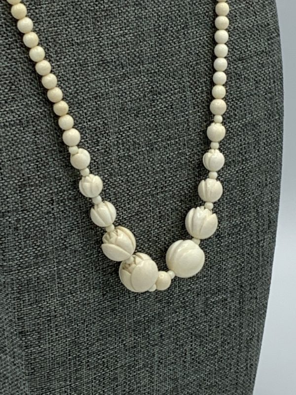 Carved mammoth ivory beads