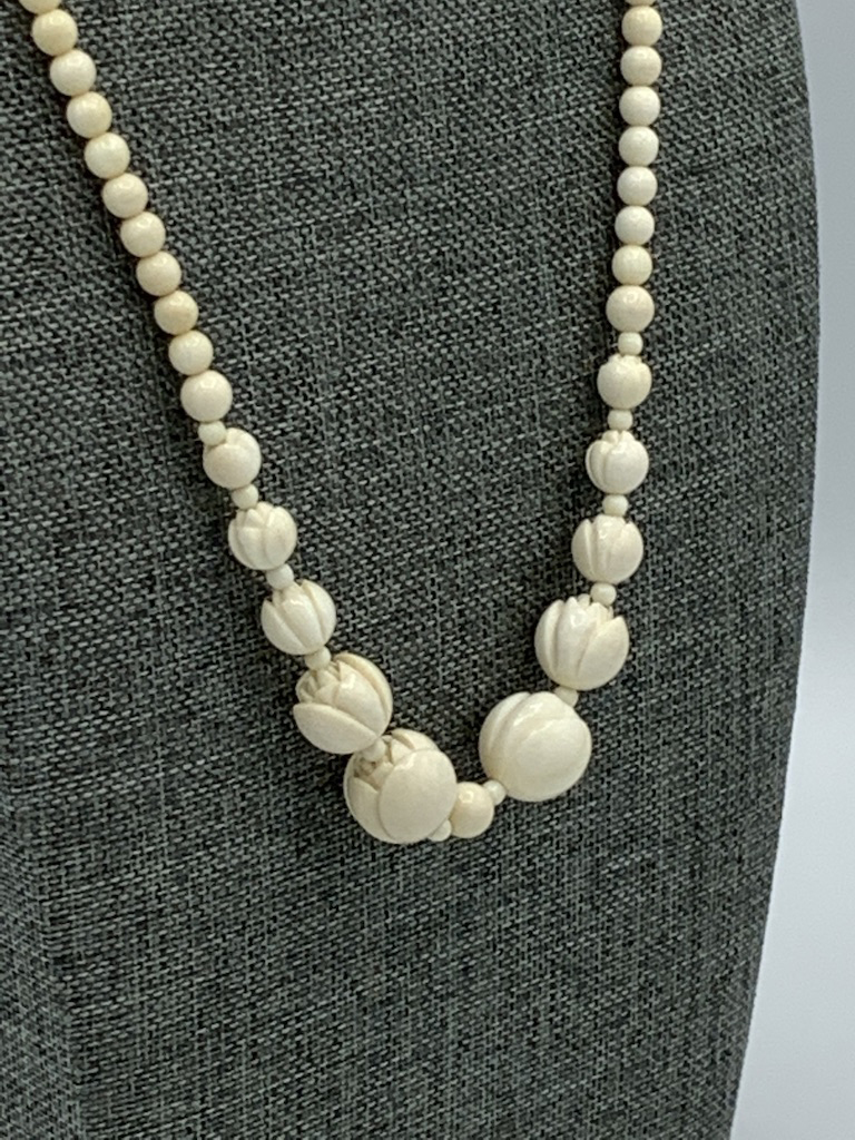 Carved mammoth ivory beads