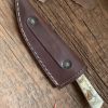 custom DMP knife in sheath