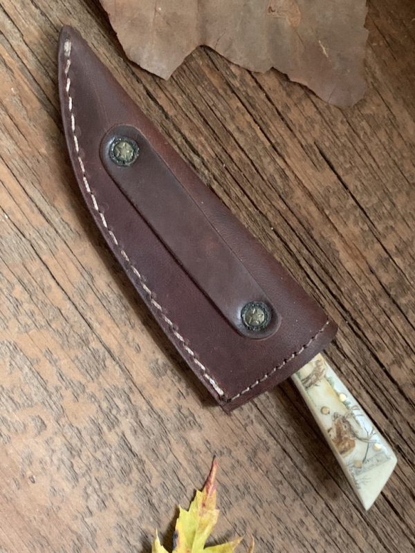 custom DMP knife in sheath