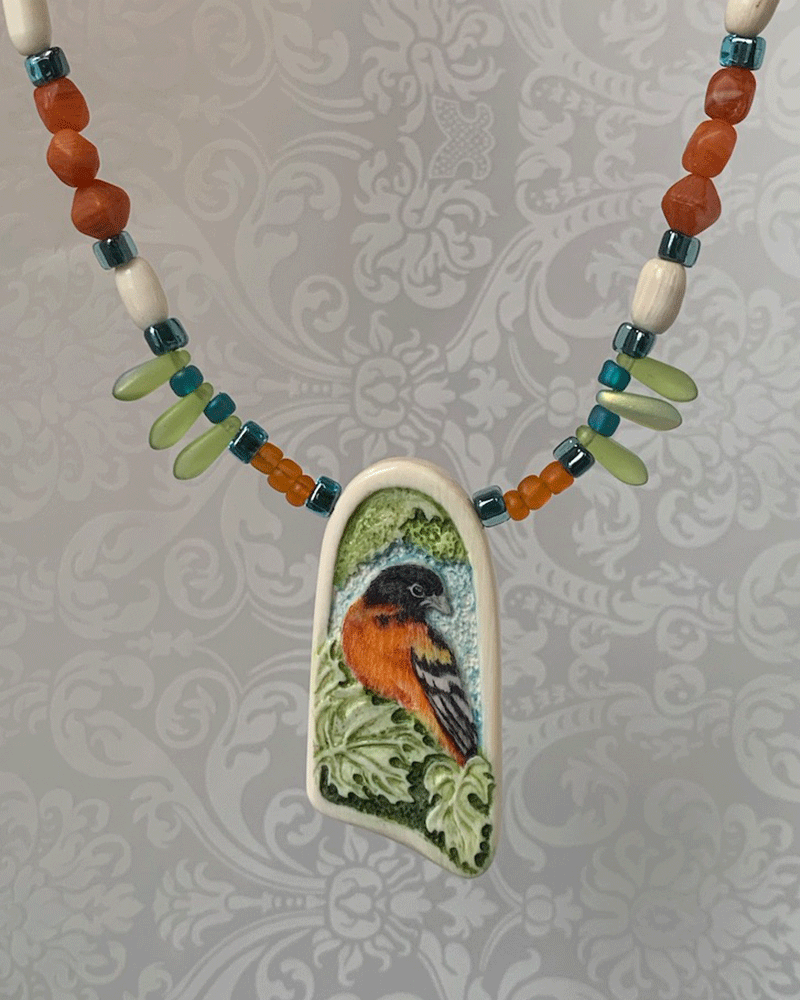 3 D carved and scrimshawed Baltimore Oriole