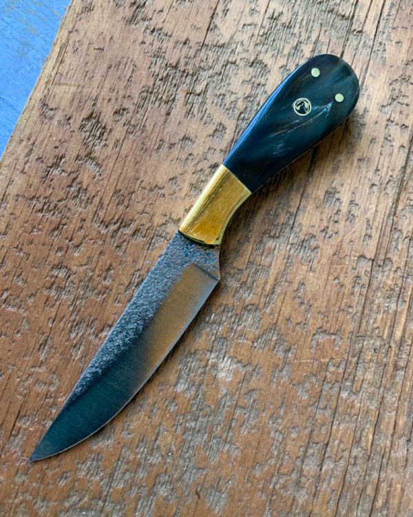reverse side of Prowling tiger patch knife